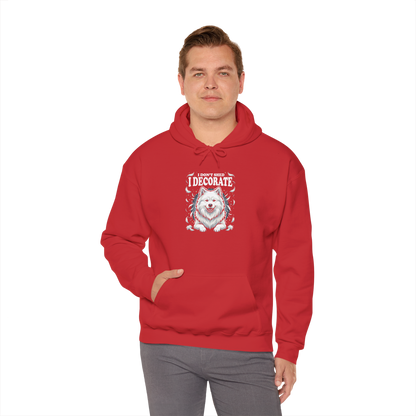 "I Don't Shed, I Decorate" Hoodie — red, worn by model