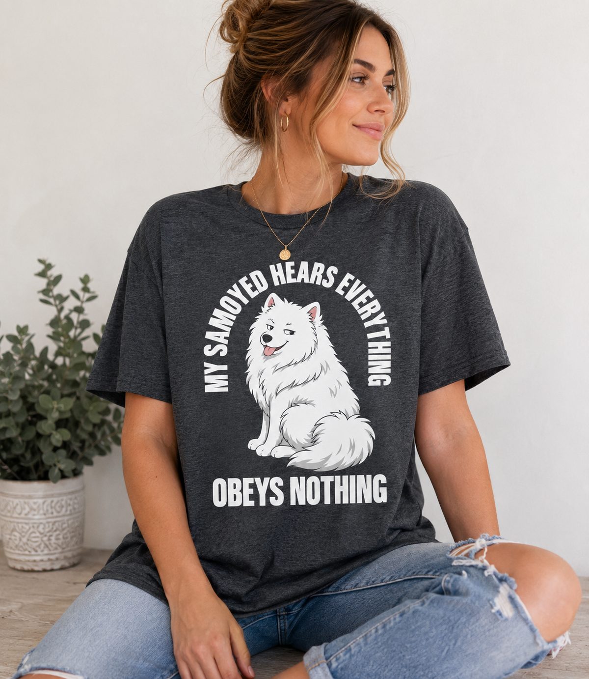 Dark heather Samoyed owner t-shirt worn by female model