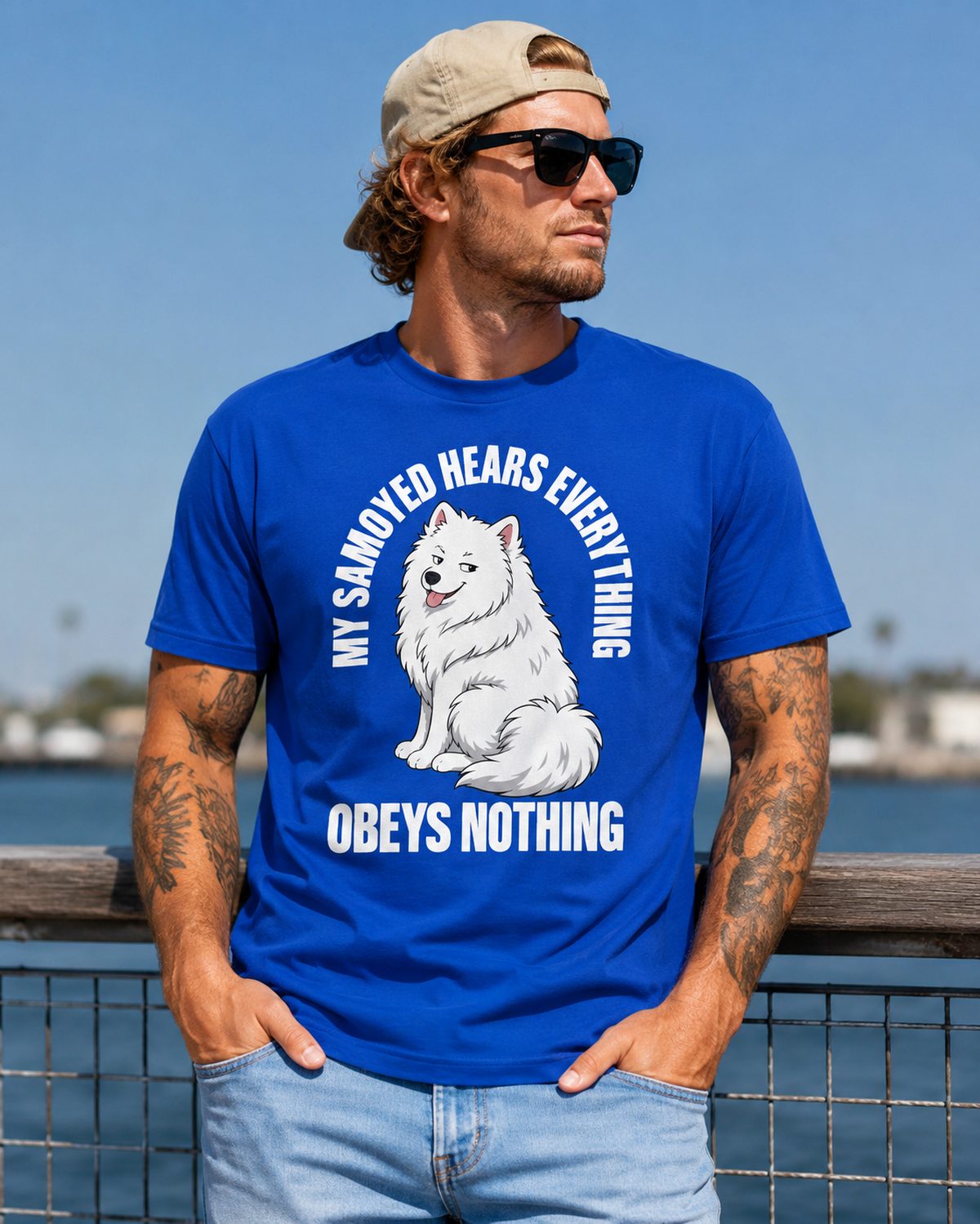 Royal blue Samoyed owner funny t-shirt worn by male model